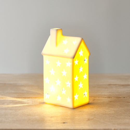 Scandi Inspired Nordic LED Light Up House. matte white ceramic house. Similar Charlested and Neptune. layered lounge, 